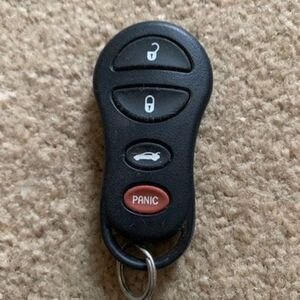 Daimler Chrysler Keyless Entry Remote Control Key Fob P/N 04802260 AA FCC ID: GO
